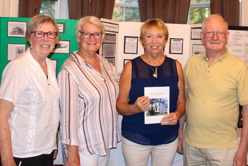 The four people who are responsible for the book, Esther of Farringford, are, from left, Ann Greyborn, Irene MacArthur, Lynne Thiele and Bert Christie.