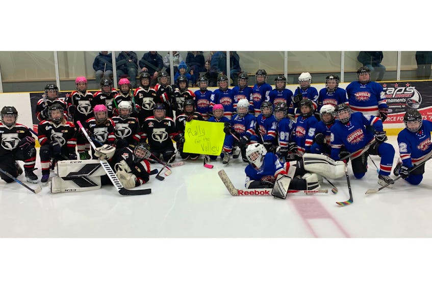 The Summerside girls’ atom A Capitals recently donated $464, raised through three of the team’s 50/50 draws, to the Tyne Valley Community Sports rink rebuild fund. The team donated the money after a game against the Tyne Valley Tornadoes atom A girls.