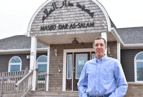 Zain Esseghaier stands outside the Masjid Dar As-Salam mosque on MacAleer Drive in Charlottetown on Sunday. The mosque also houses the Muslim Society of P.E.I., for which Esseghaier is the spokesman. Both remain closed due to COVID-19. - Michael Robar