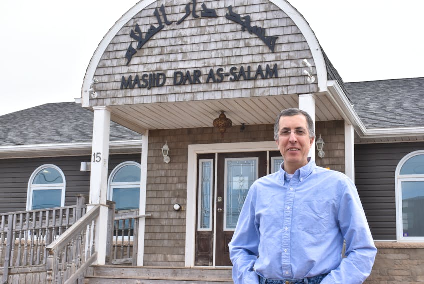 Zain Esseghaier stands outside the Masjid Dar As-Salam mosque on MacAleer Drive in Charlottetown on Sunday. The mosque also houses the Muslim Society of P.E.I., for which Esseghaier is the spokesman. Both remain closed due to COVID-19. - Michael Robar