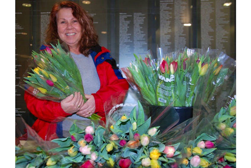 Gena Yeo of Darlington, P.E.I. was one of many Islanders who purchased tulips in the Queen Elizabeth Hospital lobby on Feb. 27.
