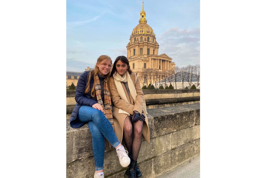 Flat River native Paige Miller, left, visits the Les Invalides building in Paris, France, with her friend, Avery Grainger, in this undated photo. Miller has been living in France and working as an au pair since August. - Contributed