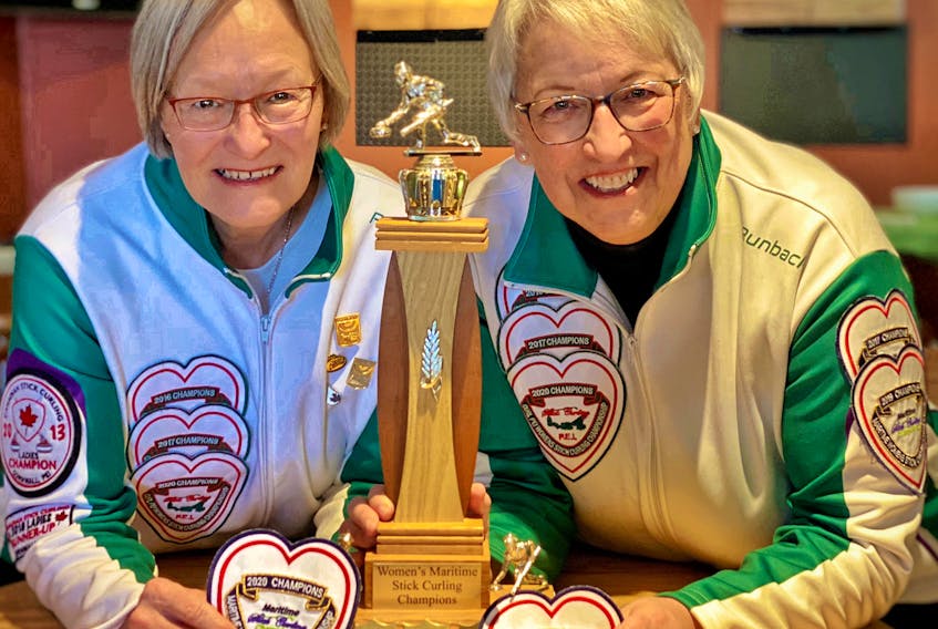 The Cornwall Curling Club team of Ruth Stavert, left, and Gloria Clarke won the women’s division of the recent Maritime Stick Curling Championships in Woodstock, N.B.
