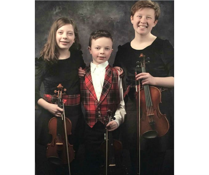 Elspeth, left, Rowan and Lachlan Bruce are the Bruce Family Fiddlers. The trio will perform at the July 28 Bonshaw Hall ceilidh concert.