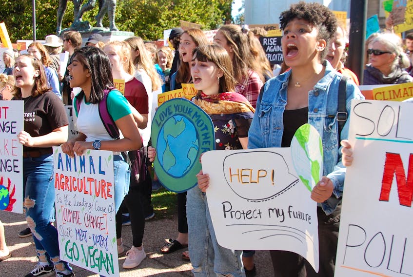 Hundreds of Island students took part in a large rally Friday in Charlottetown as part of the Global Strike on Climate. Most of the protesters weaved through the streets of the city chanting “climate justice’’ and calling on all levels of government to act. JIM DAY/THE GUARDIAN