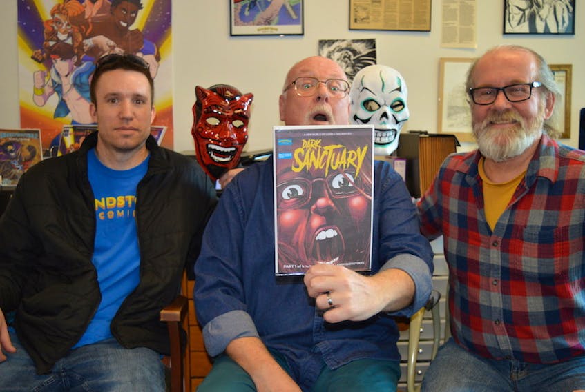Robert Doan, left, and Sandy Carruthers, right, with Sandstone Comics, have jumped into the horror genre with Dark Sanctuary, written by Charlottetown writer Dave Stewart.