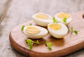 A hard-cooked egg makes a quick breakfast, along with a slice of toast, a favourite spread and a piece of fruit.