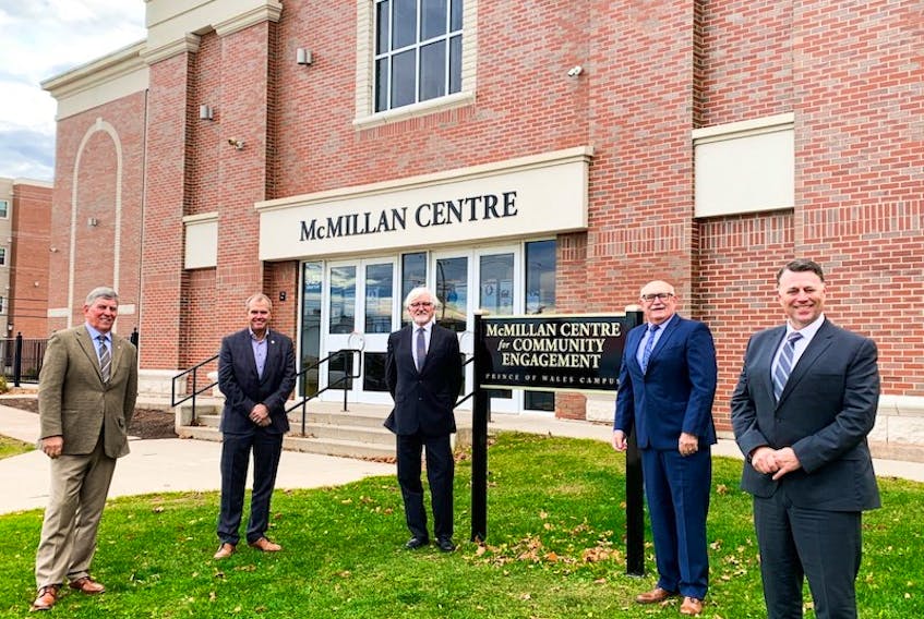 Gordon MacInnis, left, vice chairman of the Holland College board of governors, is shown with Kent Scales, chairman of the Holland College Foundation board of directors; Alexander (Sandy) MacDonald, president of Holland College; Brian McMillan, former president of Holland College, and Premier Dennis King in front of the newly-named McMillan Centre for Community Engagement.