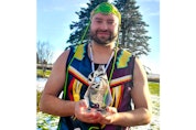 Richard Pellisier-Lush holds the National Indigenous Coaching Award he won in November.