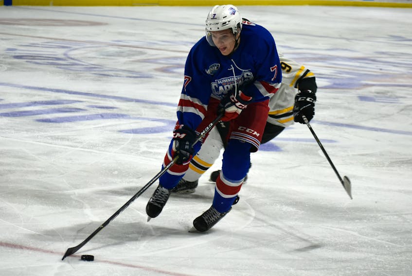 Summerside Western Capitals defenceman Jacob Arsenault of Richmond carries the puck during a Maritime Junior Hockey League game against the Campbellton Tigers last season. The Caps host the Yarmouth Mariners in their home opener at Eastlink Arena on Saturday at 7 p.m.