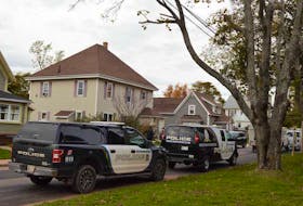 Summerside police gathered outside a house on Cedar Street Wednesday afternoon. Three men were arrested and face charges as a result of an ongoing investigation.