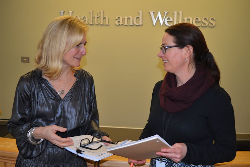 Dr. Heather Morrison, left, P.E.I.’s chief public health officer, talks with Erin Bentley, senior public health policy and planning officer in the Department of Health and Wellness’s communicable disease program on Friday following a media briefing on COVID-19. Morrison said there are no confirmed cases of the coronavirus on P.E.I. and her office in receiving updates five times a week from the national chief public health office.