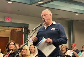 Danny Woods, a Millennium Drive resident, gives his comments and concerns about the traffic, accessibility and property value revolving around the potential rezoning of Reddin Meadows in Stratford. Wood spoke at a Wednesday, Nov. 27, public meeting at Stratford Town Hall.