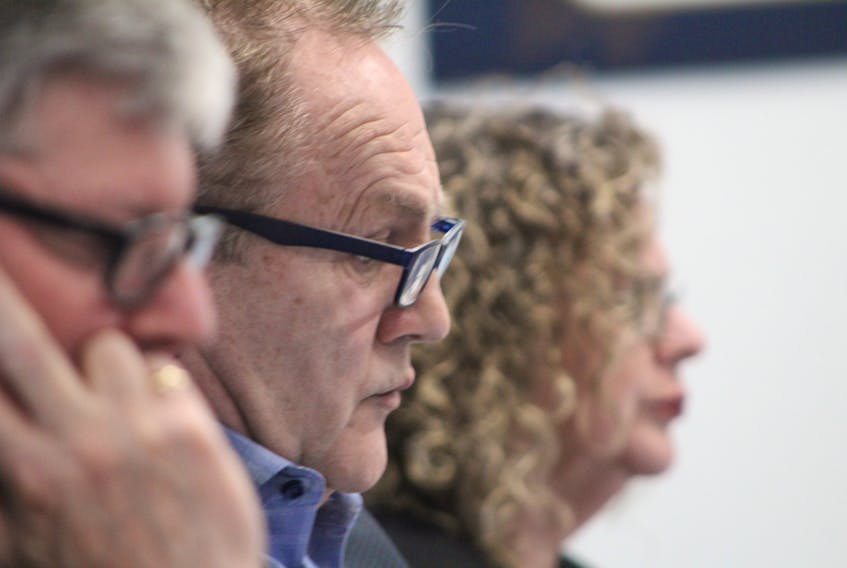 Stratford councillors Gary Clow, left, Steve Gallant and Gail MacDonald attend a town council meeting at the Stratford Town Centre in March 2020.