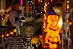 A spo-O-o-O-oky skeleton hangs outside Gina MacMillan's heavily-decorated house on Greenfield Avenue in Charlottetown.