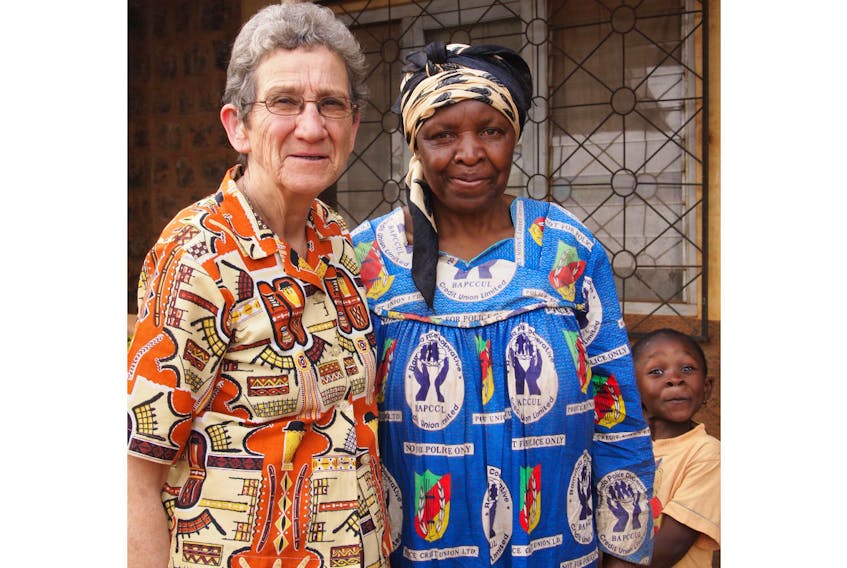 Sister Cecile Buote, left, a missionary sister in Cameroon, Africa, is shown with one of the families she serves. She will be recognized on Sunday, Dec. 8, during a special fundraiser at the Rustico Bay Seniors Club in Rustico from 11 a.m. to 4 p.m. The church is located at 2104 Church Rd., Route. 243.