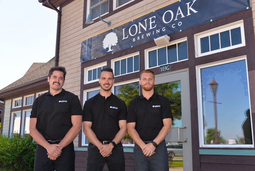 Lone Oak Brewing Co. owners Spencer Gallant (also head brewer), left, Jared Murphy (CEO) and Dillon Wight (sales) are planning to open in the first week in October.