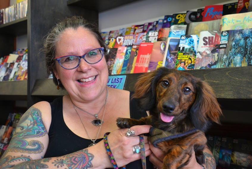 Sue Smith, co-owner of The Comic Hunter in Charlottetown, always brings her dog, Mazzy, to work. Smith isn’t sure what she’d do if a pet-related incident occurred.
