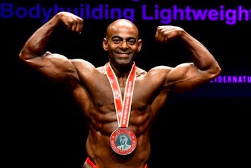 Christo Jose poses with his silver medal in the first ever Ben Weider Natural IFBB Pro Qualifier and 60th Mr. Universe held at Monument National Historic Theatre in Montreal.