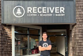 Owner, operator and head coffee roaster Chris Francis gets his new Receiver Coffee Co. headquarters ready for a grand opening. Submitted