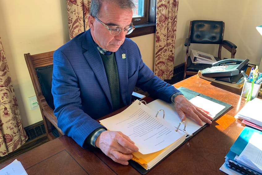 Charlottetown Mayor Philip Brown reviews his schedule of meetings on Friday at City Hall before heading to the airport for his first official trip to Ottawa.