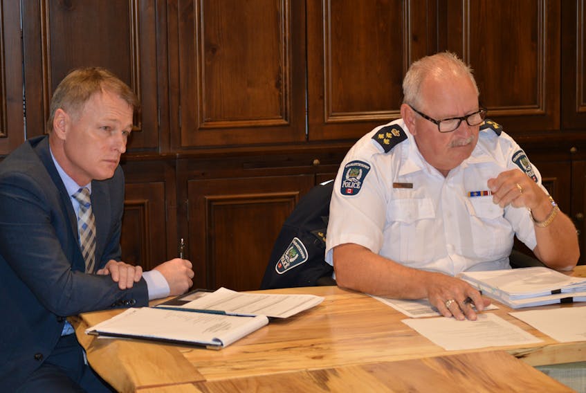 Charlottetown Police Services Chief Paul Smith, right, says the proposed bylaw amendment around beehives is designed to prevent crates of them from being located in residential neighbourhoods. The issue came up again at a recent protective and emergency services meeting. Also pictured is Deputy Police Chief Brad MacConnell.
