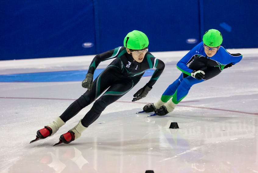 Charlottetown’s Alex Rogers, left, won one of eight gold medals for P.E.I. at the Atlantic Cup Speed Skating Championships in Charlottetown during the weekend. Also shown is Luka Cornacchia of the CPV Gatineau club. Amanda Burke/Special to The Guardian