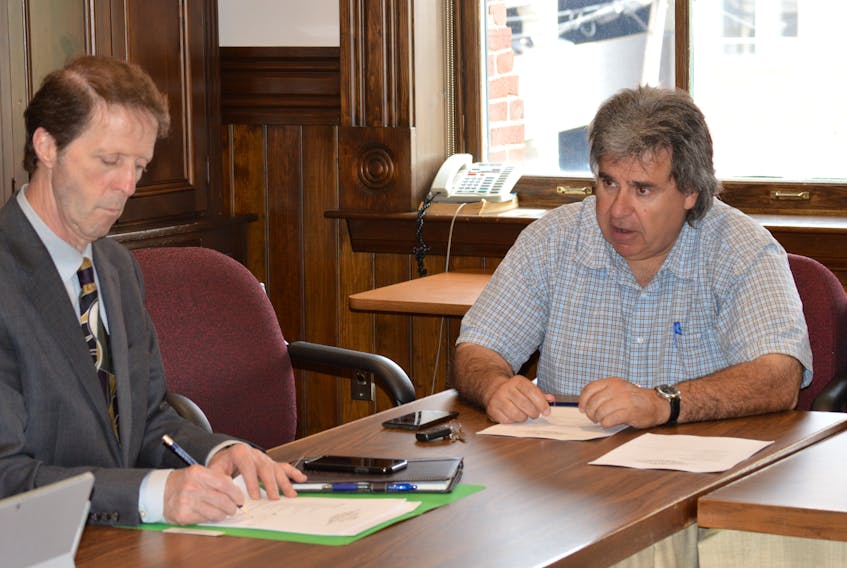 Coun. Mitchell Tweel, right, had a lot of questions about why the Charlottetown Event Grounds isn’t hosting major concerts during a meeting Wednesday of the city’s economic development, tourist and events management committee. Sitting to his left is Peter Kelly, the city’s chief administrative officer.