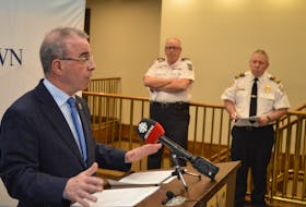 Charlottetown Mayor Philip Brown held a press conference at City Hall on Tuesday afternoon in which he laid out the city’s plans to try and prevent the spread of the coronavirus (COVID-19 strain) outbreak. Police chief Paul Smith, left in the background, and fire chief Randy MacDonald also took part in the media briefing.