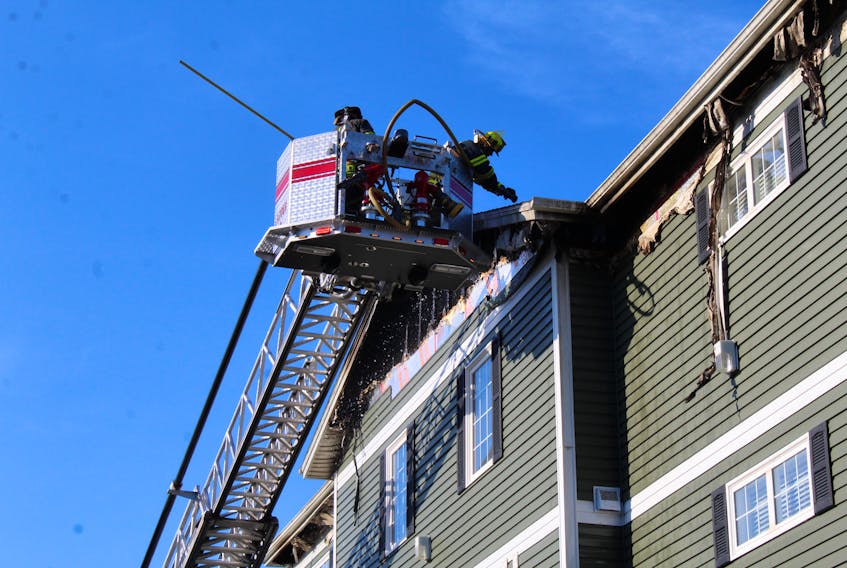 Firefighters respond to a flare-up Thursday morning, fewer than 24 hours after a fire ravaged a Harley Street apartment complex in Charlottetown.