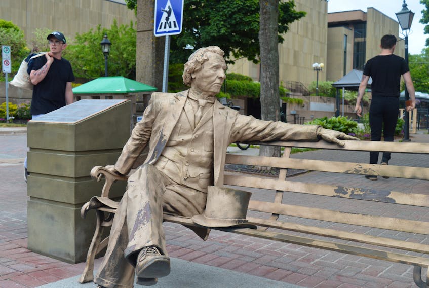 The bench statue of Sir John A. Macdonald at the corner of Victoria Row and Queen Street in Charlottetown shows the effects of having been sandblasted earlier this week after it was doused with red paint.