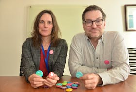 Katriona MacNeil, left, an industrial hygienist with BioVectra’s health and safety group, brought the idea of implementing the CMHA's Not Myself Today button program about three years ago to the company's human resources group, including Lester Wood, the department's executive director.