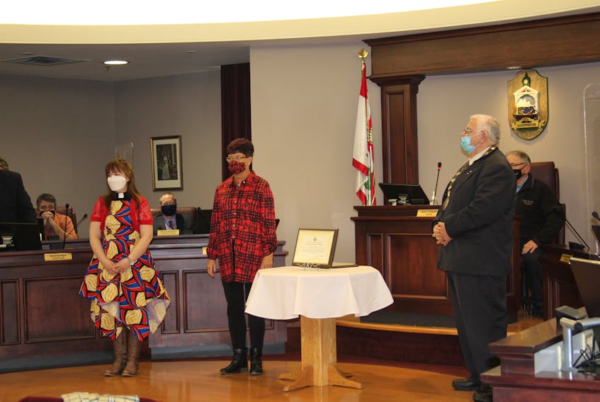 From left, Rev. Rachel Campbell, Barbara A. Gallant and Mayor Basil Stewart. Campbell and Gallant received an award for their virtual Remembrance Day ceremony at Trinity United Church.