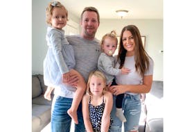 Georgia Arsenault, left, her father Neil, sisters Lily, 6, and Fiona, 2, and mother Melanie.