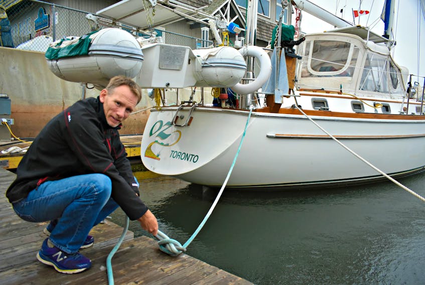 Paul Bingham secures his vessel in Summerside marina.