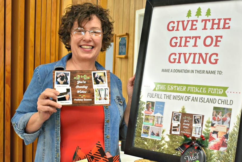 Jennifer Murphy sells fudge and cards to help support a worthy cause that grants dreams to Island children.