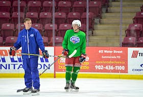 Summerside D. Alex MacDonald Ford Western Capitals assistant coach Jason Gallant chats with forward Marc Richard during practice at Eastlink Arena in January before the team resumed game action in the Maritime Junior Hockey League (MHL).