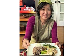 Summerside resident Tomoko Craig shows off the traditional Japanese dish she made for her Cooking with Culture presentation.