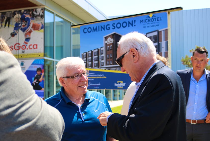 Summerside City Coun. Bruce MacDougall, left, chats with Caboteer CEO Glenn Squires. Squires was on-site at Credit Union Place for the announcement of his upcoming development of a Microtel by Wyndham that will be located on Credit Union Place grounds.  
JP Desrosiers