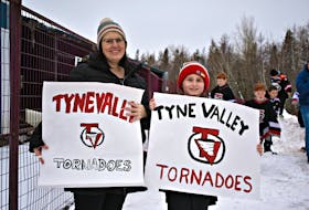 Kim Hutchinson, left, and her son Ryan came to show their support for Tyne Valley. More than 1,000 people gathered in front of the former Tyne Valley Community Sports Centre in a Kraft Hockeyville bid, Saturday morning.
