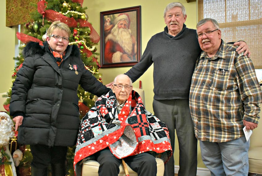 Wallace J. Palmer received a ‘warm hug from the nation’ through a Quilt of Valour for his service on the frontline during the Second World War. The quilt was presented by Kathy Bulger, George Dalton, and Palmer’s son Roland Palmer came from Barrie, Ont. to attend the special ceremony.