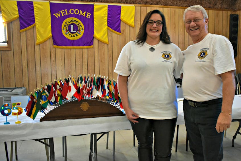 Nancy Beth Guptill sponsored by Lion Don Reid joined the Summerside Lions Club recently. Lions Club International is the largest and most active volunteer service in the world. There are over 1.4 million members in over 200 countries and geographical areas, as represented by the flags on the table.