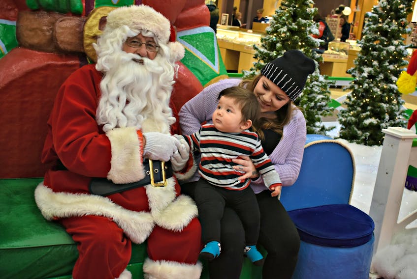 It was a magical moment for Karver Wagstaff as he met Santa Claus for the first time. Santa’s arrival at the County Fair Mall in Summerside, Saturday, offered families the change for free photographs in exchange for food donations. Brittany Wagstaff held her 8-month-old son and said, “This experience will definitely make Christmas a bit more special for Karver.”