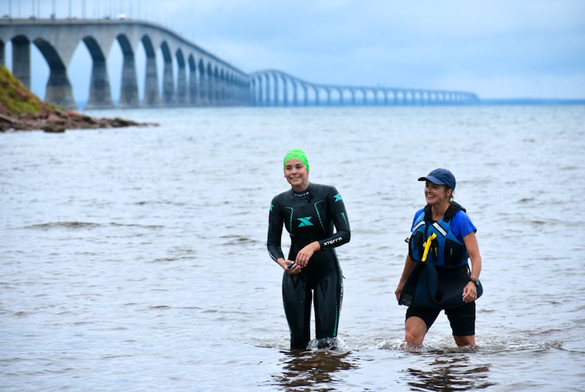 Paige Crowell, left, was the only P.E.I. swimmer in the Big Swim across the Northumberland Strait Sunday. She was accompanied along the way by kayaker Angie Doyle, from Dartmouth, N.S.