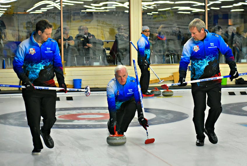 Americans, from left, Dixon Freeman, Steven O’Conner and Mark Tolvstad curled in Summerside Sunday as part of the Canam Cup.