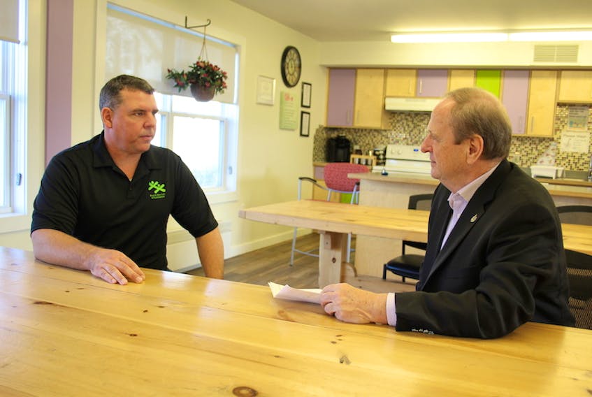 Adam Binkley, left, executive director of the Summerside Boys and Girls Club and Egmont MP Bobby Morrissey, chat in the club’s Youth Engagement Centre. Morrissey announced funding, Friday, for the organization’s Strengthening Families Program.