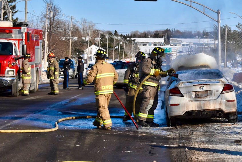Summerside Fire Services extinguishes a car fire on Water Street East on Wednesday, Jan. 22.