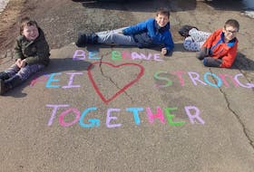 Wyatt, Logan and Ethan Bernard spent part of their weekend drawing inspirational messaging on their driveways for their whole neighbourhood to see. Several families on Wilfred Street in Miscouche did the same.