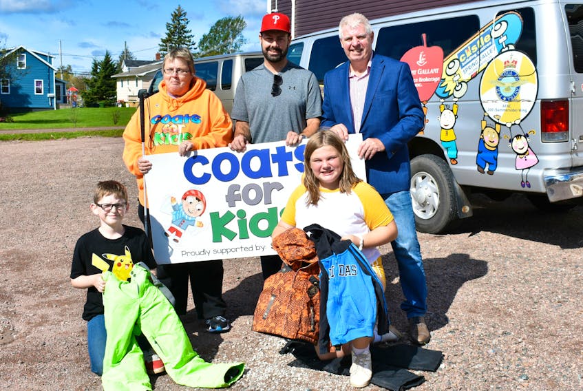 Andràs Hirtle from the Summerside Boys and Girls Club, left, organizer Sandra Gallagher, Summerside Coun. Justin Doiron, Randi-Lynne Parker from the Summerside Boys and Girls Club and David Groom invite anyone who can help to donate to Coats for Kids.