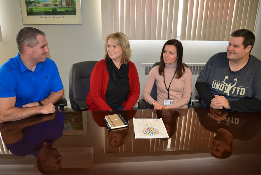 Reviewing plans for the Feb. 8 Neighbour to Neighbour celebration at Westisle Composite High School are, from left, Paul Young, administrator of Community Hospital’s West; Maxine Rennie, executive director of CBDC West Prince Venture; Christina Phillips, manager of West Prince Primary Care and Scott Smith, West Prince Community Navigator.